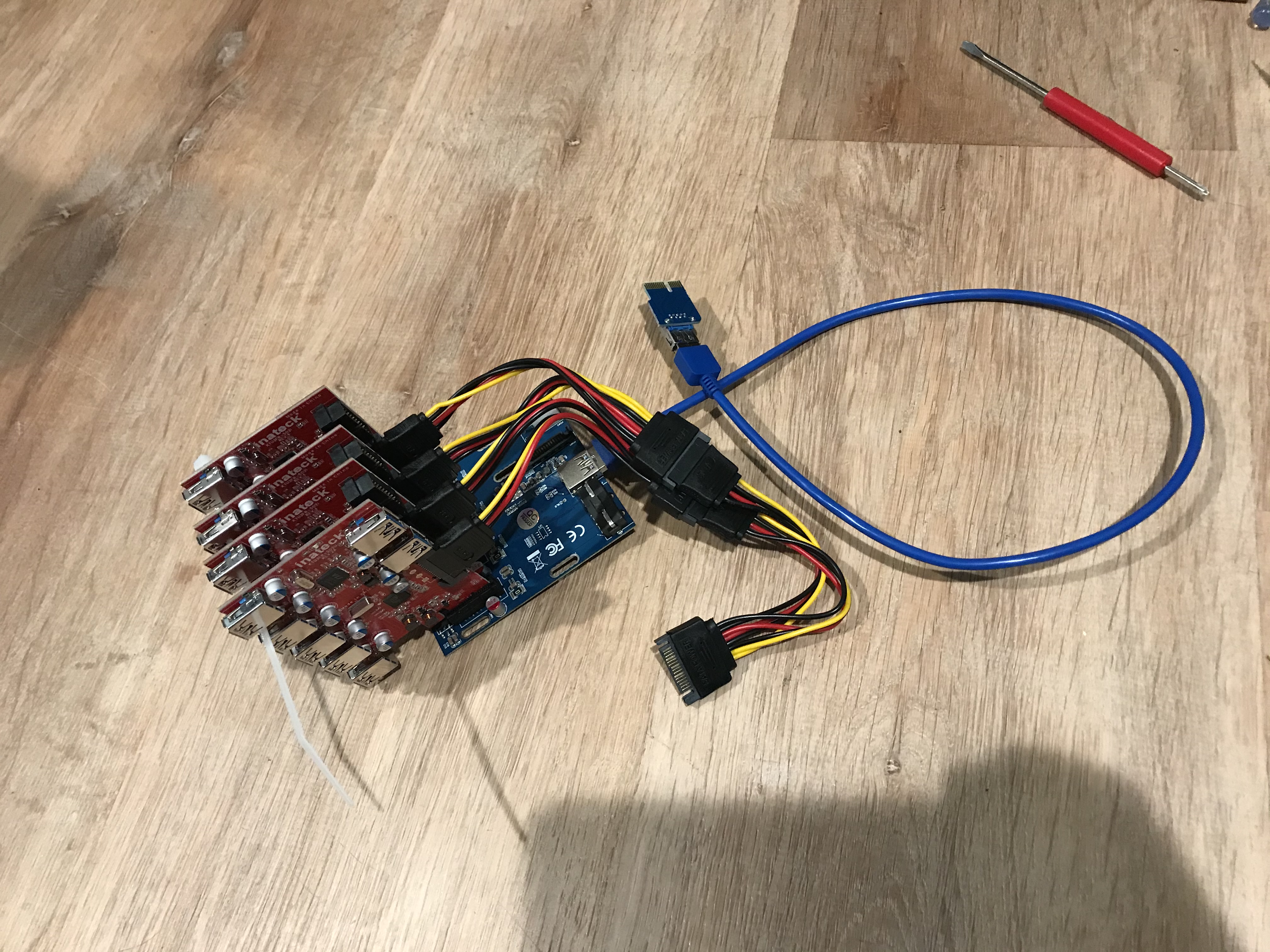 4 USB cards plugged into USB switch card, with a USB3 cable connected weirdly